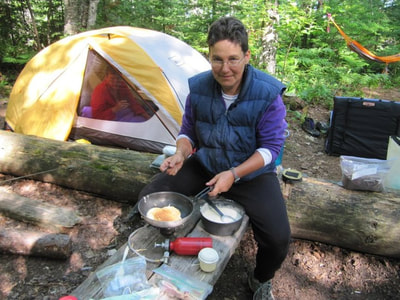 cooking over camp stove